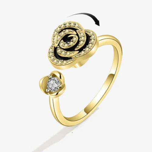 Bague rotative dorée en forme de rose avec incrustations brillantes